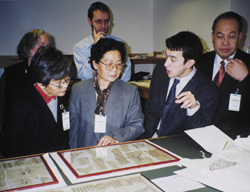 Professors Fan Jinshi and Shi Pingting of the Dunhuang Academy being shown around the British Library Conservation Studios